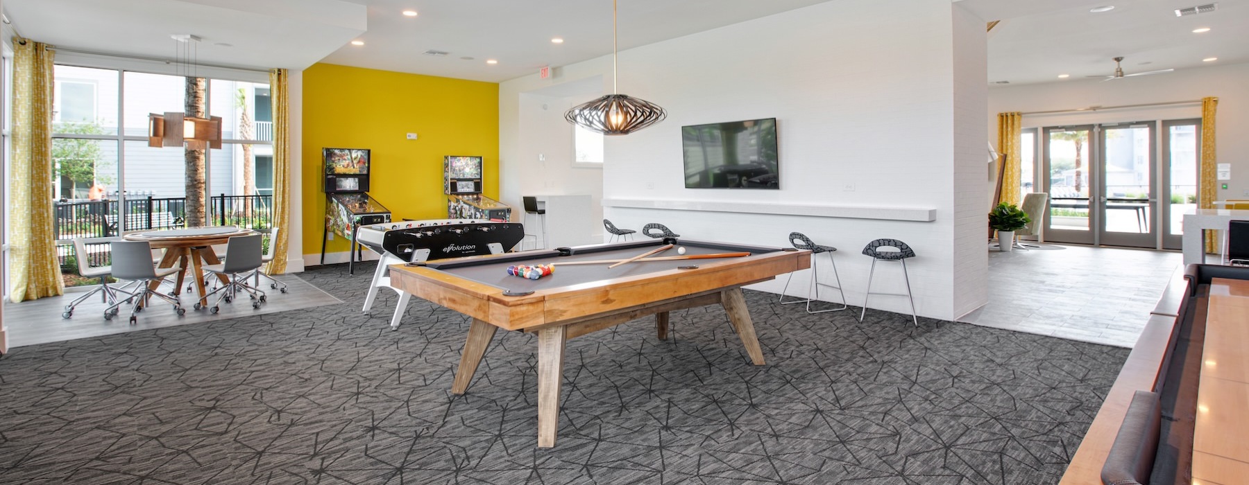 a clubroom with a pool table