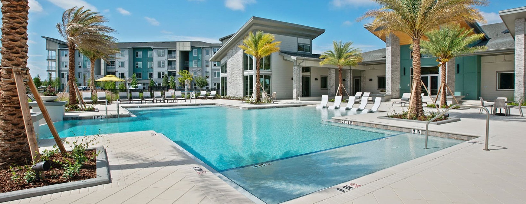 pool with lounge seating